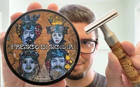 Tin of PantaRei Fresco Di Sicilia shaving soap beside a Muhle Rocca razor with a birch bark handle