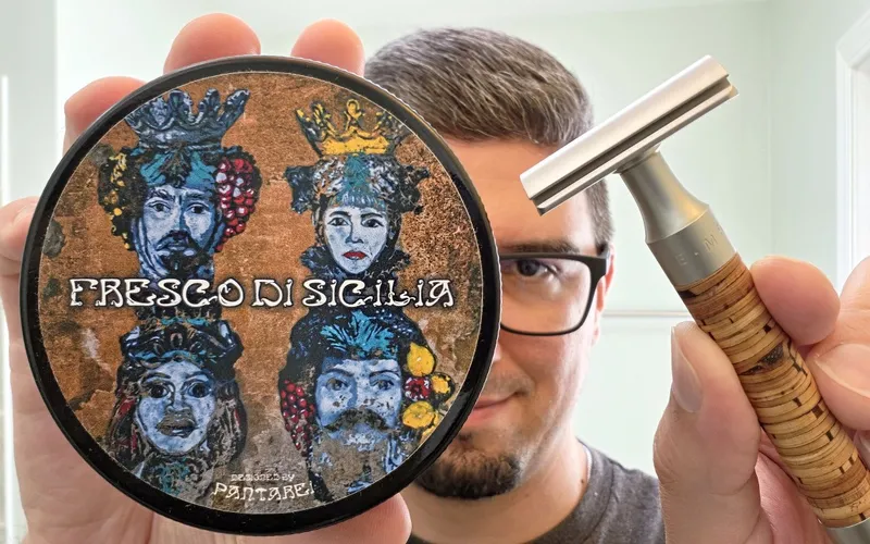 Tin of PantaRei Fresco Di Sicilia shaving soap beside a Muhle Rocca razor with a birch bark handle