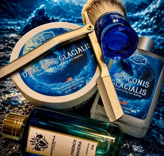 Shave setup featuring Subtle Art Soap Co. Draconis Glacialis soap, Proof straight razor, and DS Cosmetics brush