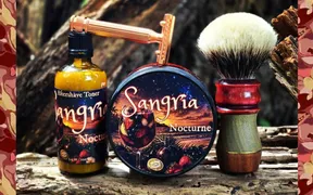The Shave Mercantile Sangria Nocturne soap puck and aftershave toner on a shave shelf