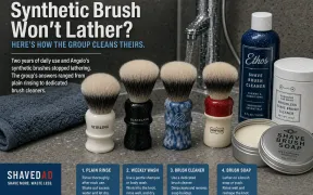 A synthetic shaving brush being rinsed under a stream of warm water at a bathroom sink
