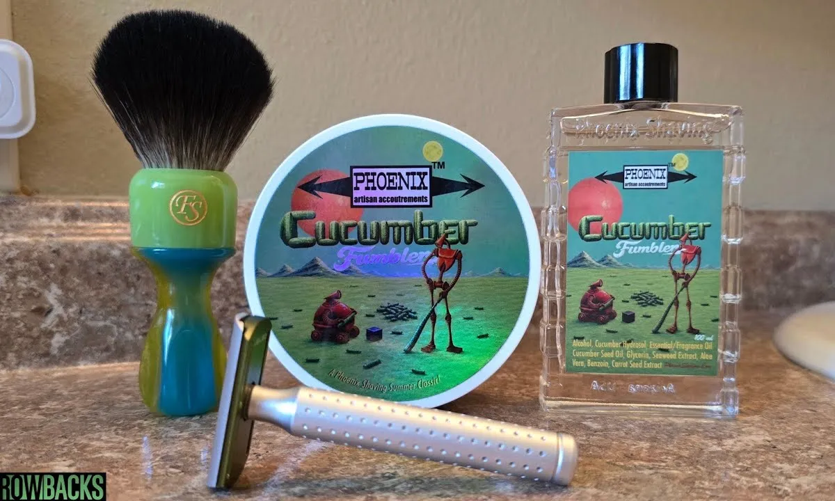 Phoenix Artisan Accoutrements Cucumber Fumbler shave soap and splash on a bathroom counter