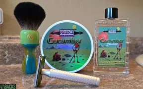 Phoenix Artisan Accoutrements Cucumber Fumbler shave soap and splash on a bathroom counter