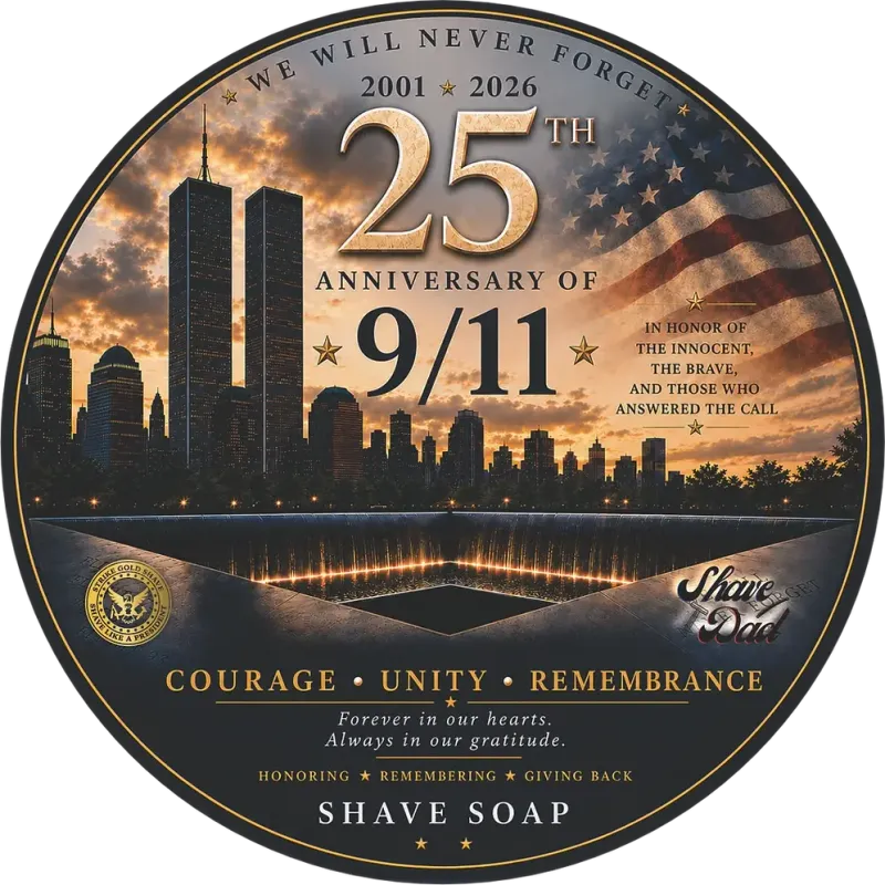 Circular soap label for the 9/11 25th Anniversary Tunnels to Towers shave soap, the Twin Towers skyline at dusk over the memorial reflecting pool with an American flag, reading We Will Never Forget, 2001 to 2026, 25th Anniversary of 9/11, In Honor of the Innocent, the Brave, and Those Who Answered the Call, Courage Unity Remembrance, with the Strike Gold Shave seal and Shave Dad logo