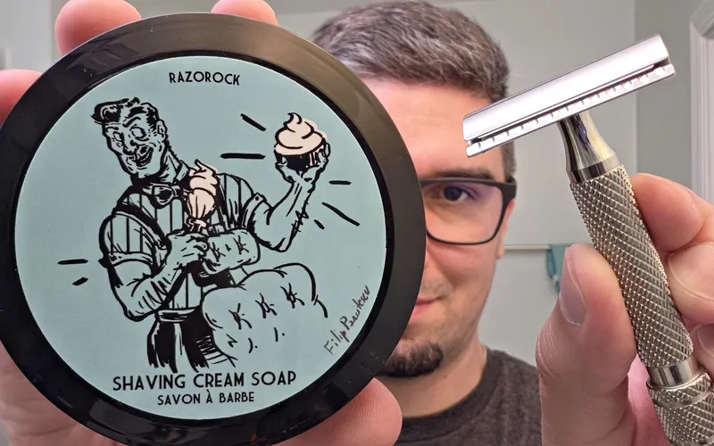 RazoRock GOAT razor beside a tub of Blue Barbershop shaving soap and its matching splash bottle