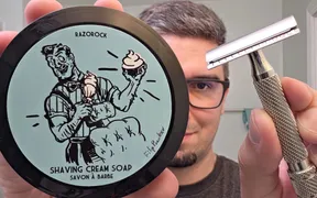 RazoRock GOAT razor beside a tub of Blue Barbershop shaving soap and its matching splash bottle