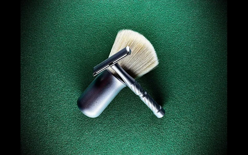 Blackland Vector razor in satin stainless steel finish with Feather Professional blade
