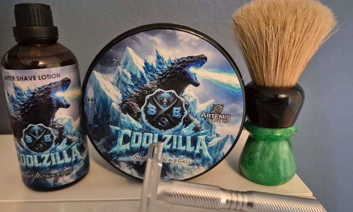 Yaqi 24mm boar brush with green sparkle handle beside BBS Coolzilla soap and Yaqi Ghost aluminum razor