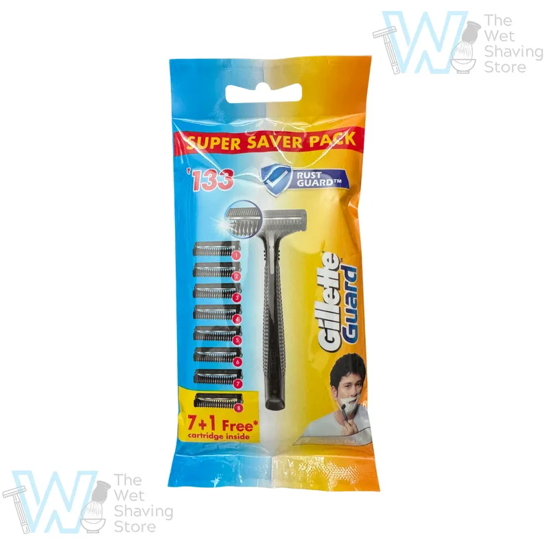 Gillette Guard Super Saver Pack with one razor handle and eight cartridges, the single blade and safety comb visible through the clear front
