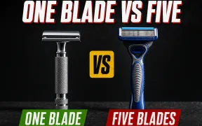 A dramatic side-lit product photograph on dark slate in YouTube thumbnail style, headline ONE BLADE VS FIVE in white block letters with a red drop shadow, a chrome double-edge safety razor with a knurled handle standing on the left over a green banner reading ONE BLADE, a yellow VS badge in the middle, and a blue five-blade cartridge razor with a lubricating strip standing on the right over a red banner reading FIVE BLADES