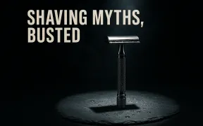 A chrome safety razor under an interrogation style spotlight on dark slate, under the headline Shaving Myths, Busted