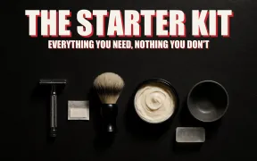 A complete wet shaving starter kit laid out on dark slate, safety razor, blade pack, brush, soap tub, bowl and alum block each in its own pool of light, headline THE STARTER KIT in white block letters with a red drop shadow