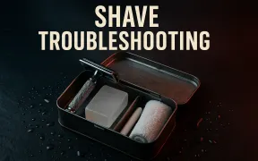 An open metal first aid tin on wet dark slate holding a safety razor, alum block, styptic pencil, and rolled towel, under the headline Shave Troubleshooting