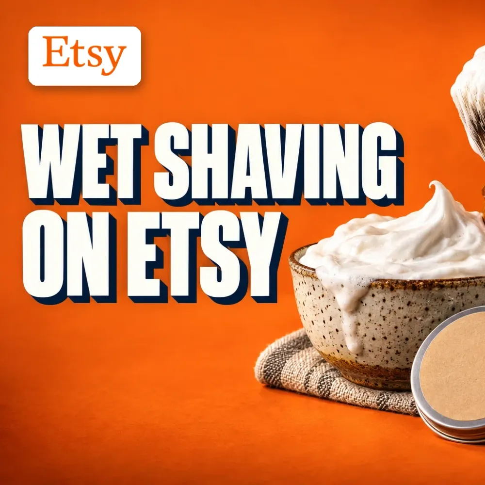 Wet Shaving on Etsy key art with the Etsy logo: a stoneware lather bowl, a lathered wooden-handled brush, artisan soap tins, an aftershave bottle and a leather strop on a bold orange background