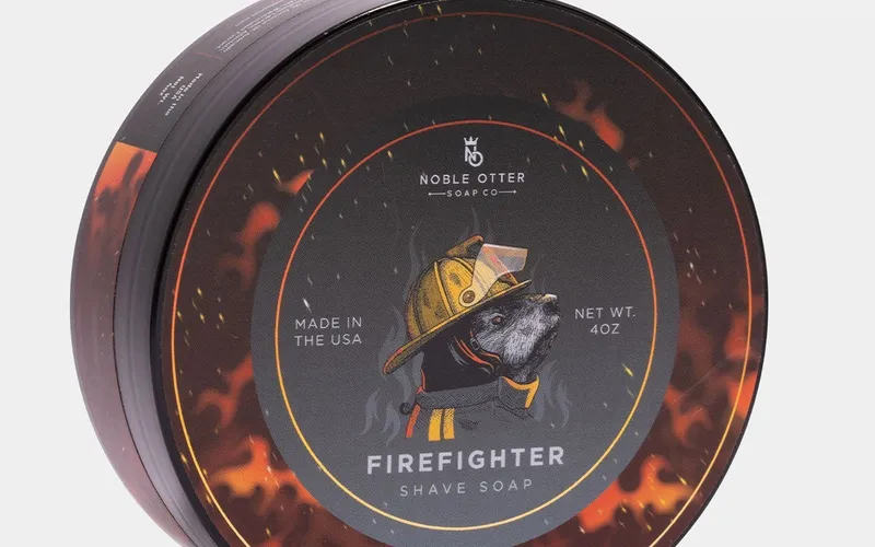 Noble Otter Firefighter Shaving Soap, top view in branded tin