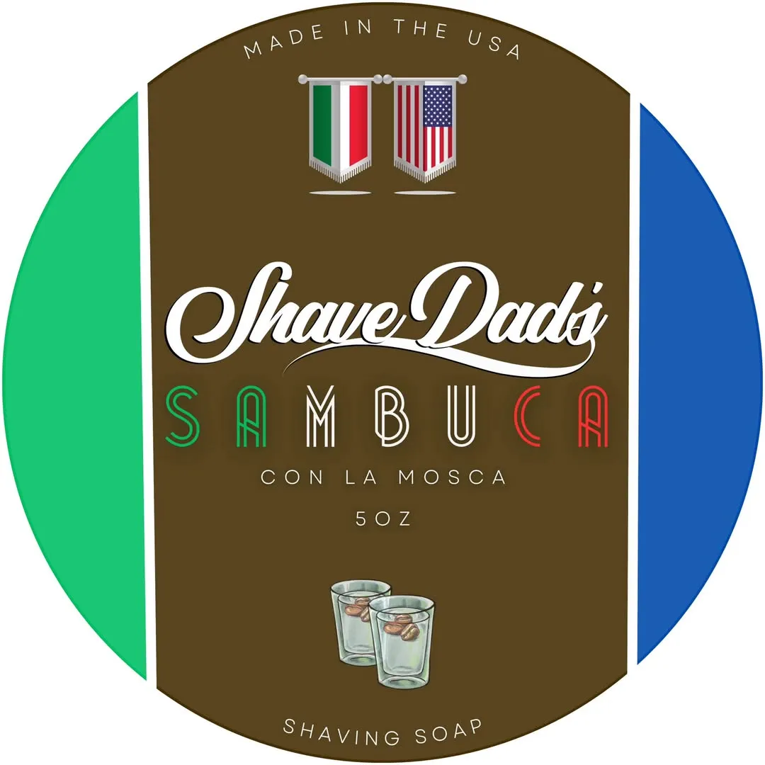 Sambuca Con La Mosca — Shave Dad × Strike Gold Shave holiday soap label, Italian and US flag bunting over two shot glasses with coffee beans