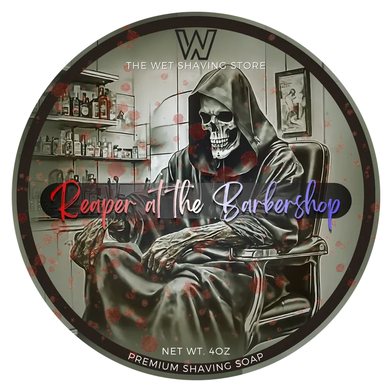 Reaper at the Barbershop shaving soap lid art: the Grim Reaper seated in a vintage barber chair, labeled Premium Shaving Soap, Net Wt. 4 oz