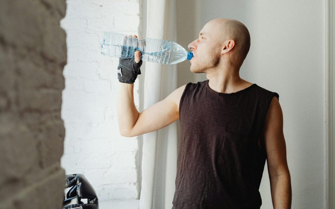 A man drinking water